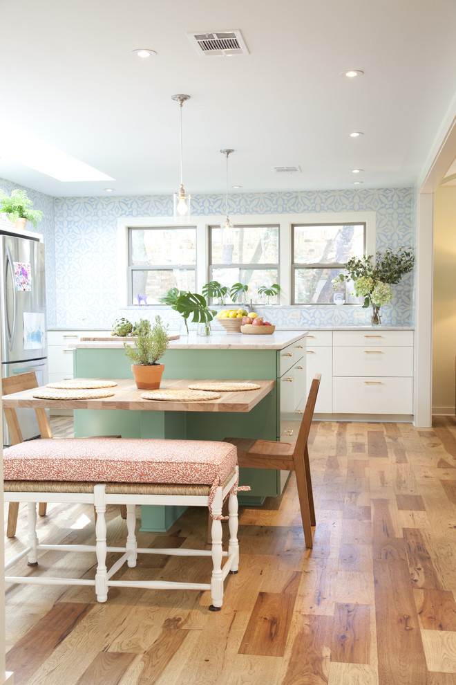 Tuscan kitchen photo in Austin with cement tile backsplash and marble countertops