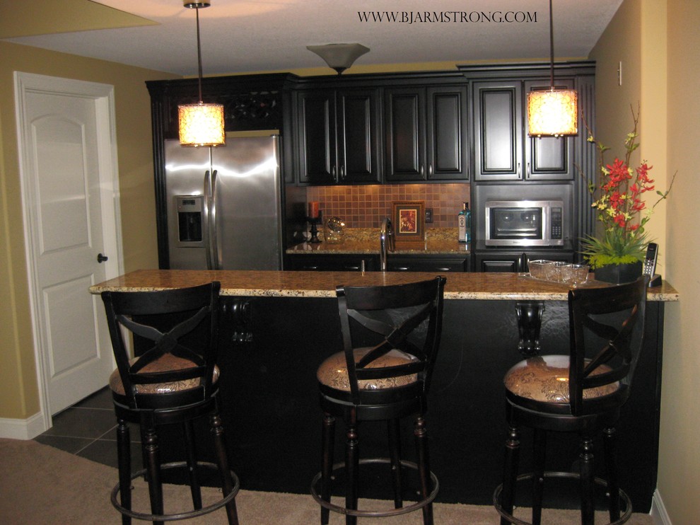 Basement Wet Bar with Granite Countertops and Stainless Steel