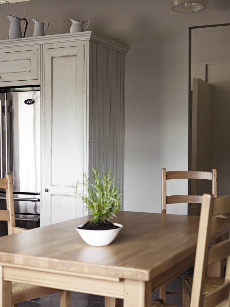 This is an example of a farmhouse kitchen in Copenhagen.