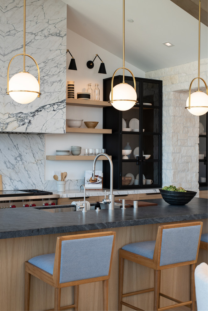 Inspiration for a medium sized classic u-shaped kitchen/diner in Orange County with a submerged sink, recessed-panel cabinets, light wood cabinets, marble worktops, white splashback, stone slab splashback, integrated appliances, light hardwood flooring, an island, beige floors and white worktops.