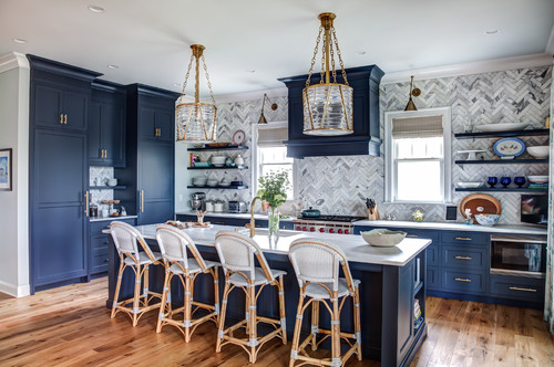 White kitchen featuring blue coastal accents