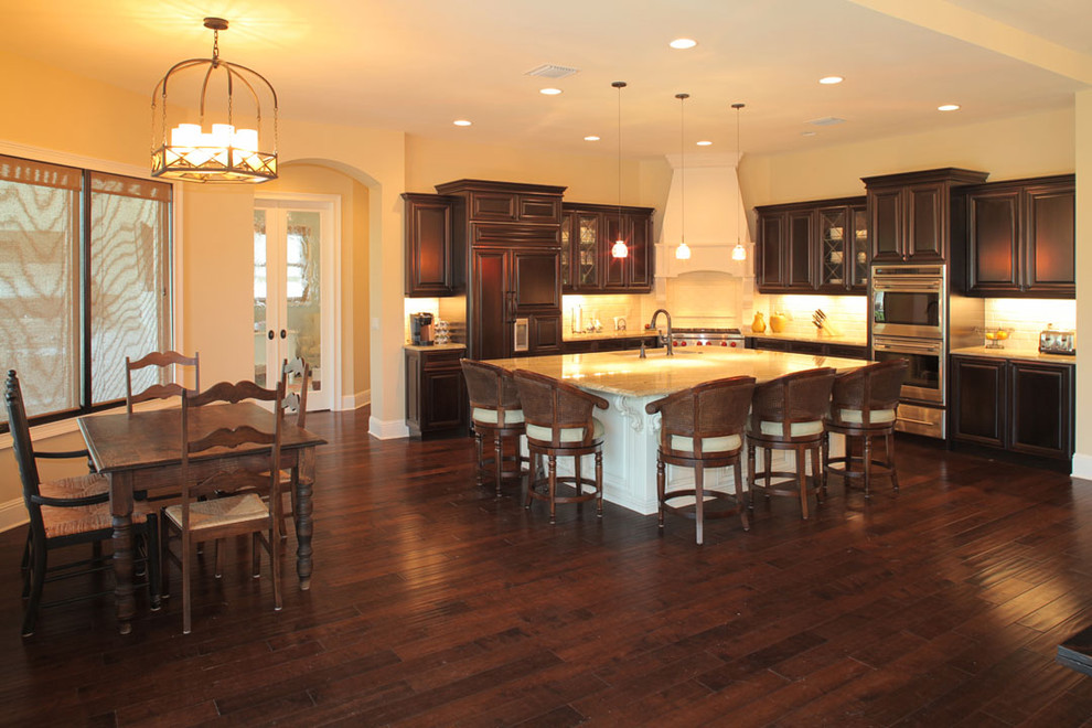 Example of a tuscan kitchen design in Tampa