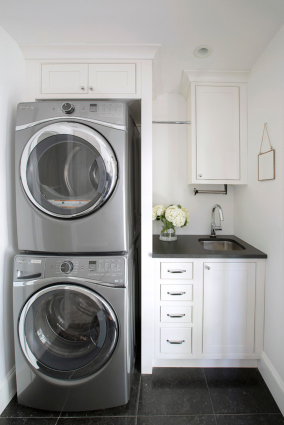 Mid-sized beach style l-shaped painted wood floor and white floor laundry room photo in New York with an undermount sink, shaker cabinets, white cabinets, granite countertops, white backsplash and mosaic tile backsplash