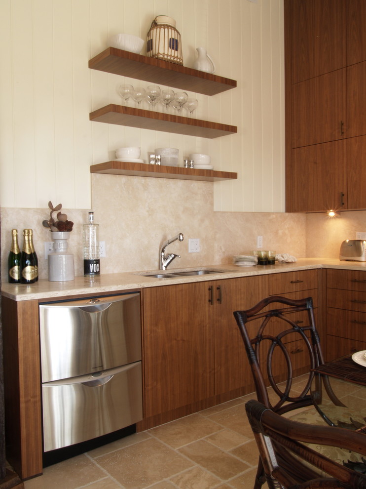 Exemple d'une cuisine exotique en bois foncé avec un électroménager en acier inoxydable, un évier 2 bacs, un placard sans porte et une crédence beige.