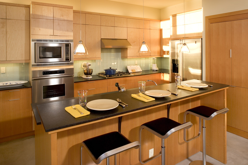 Contemporary kitchen in Seattle with stainless steel appliances.