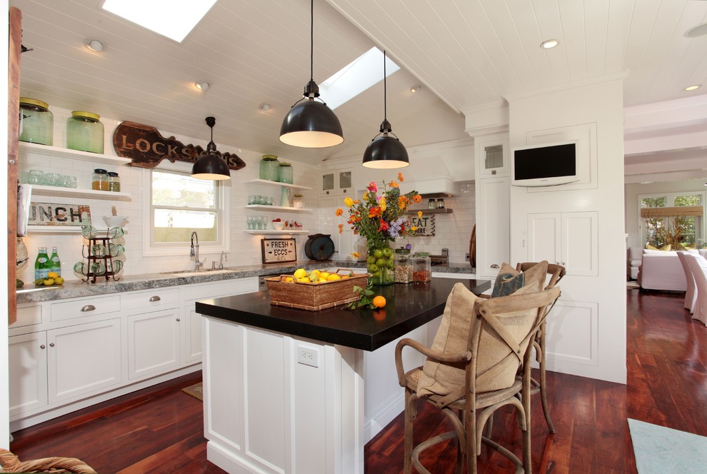 Inspiration for an eclectic open concept kitchen remodel in Los Angeles with open cabinets, white cabinets, white backsplash and subway tile backsplash