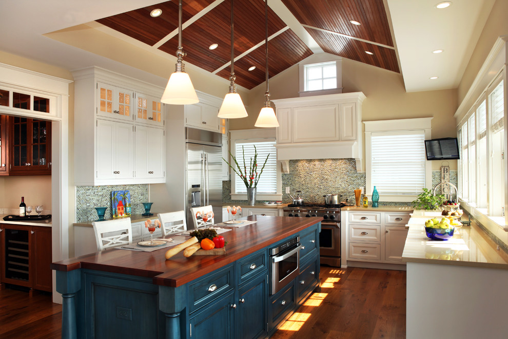 Beach style kitchen photo in Philadelphia with mosaic tile backsplash, stainless steel appliances and multicolored backsplash