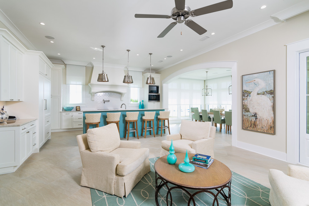 Large beach style galley porcelain tile open concept kitchen photo in Birmingham with an undermount sink, beaded inset cabinets, white cabinets, granite countertops, white backsplash, porcelain backsplash, paneled appliances and an island