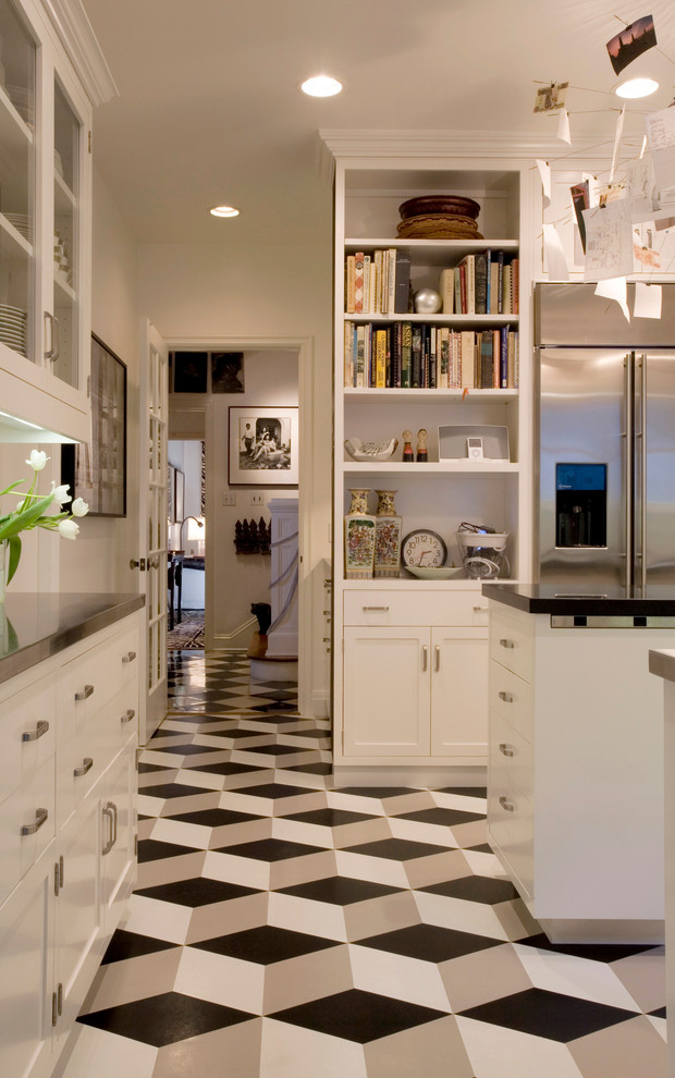 Minimalist multicolored floor kitchen photo in Los Angeles with shaker cabinets, white cabinets and stainless steel appliances