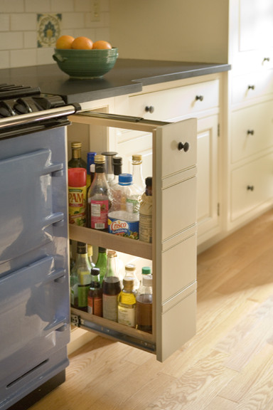 Example of a classic light wood floor kitchen design in Boston
