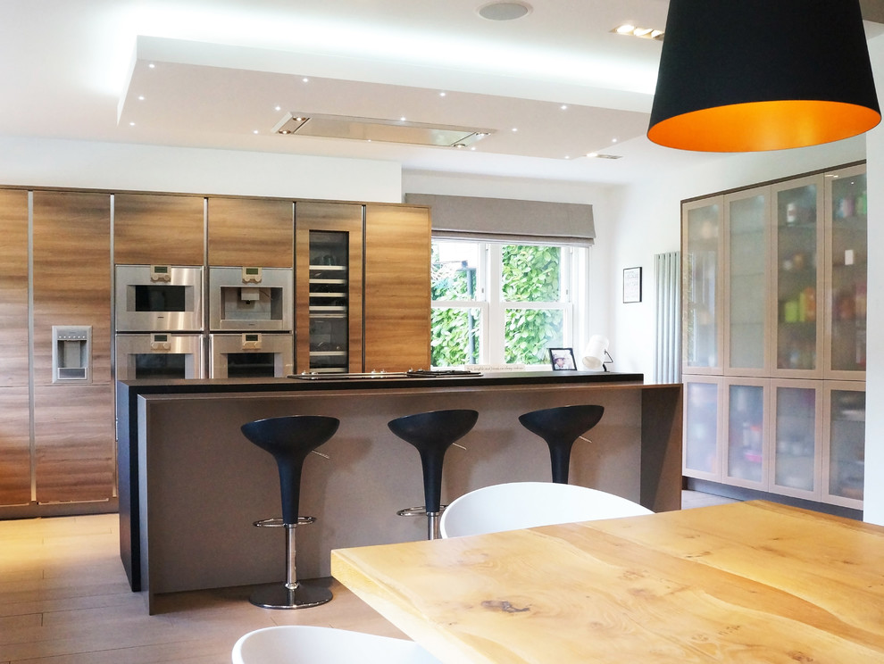 Photo of a modern kitchen in Surrey.