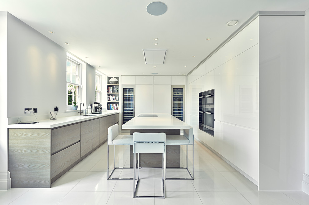 Inspiration for a contemporary grey and white kitchen in Surrey.