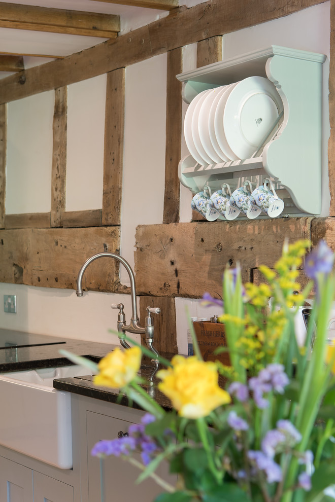 Example of a country kitchen design in Cheshire