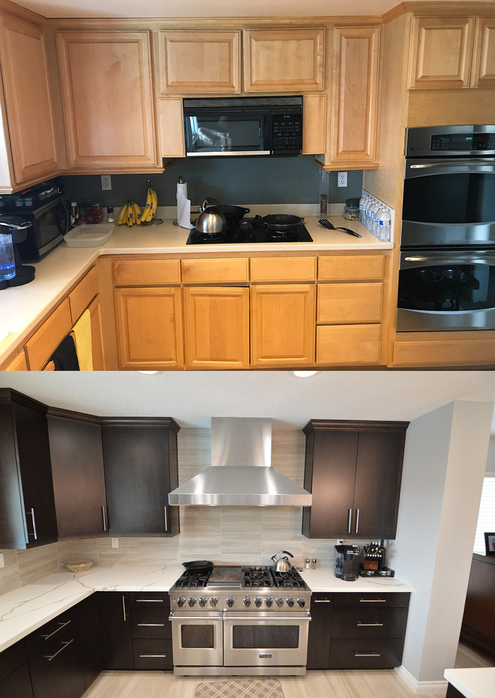 Example of a huge minimalist u-shaped ceramic tile and beige floor eat-in kitchen design in Orange County with a single-bowl sink, flat-panel cabinets, dark wood cabinets, quartz countertops, gray backsplash, ceramic backsplash, stainless steel appliances, a peninsula and gray countertops