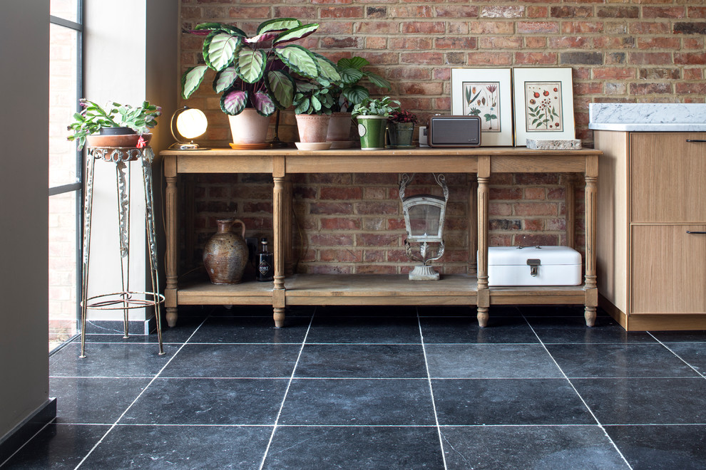 Elegant limestone floor and blue floor kitchen photo in Berkshire