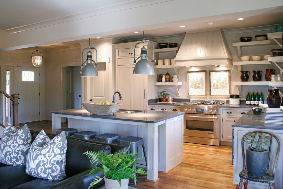 Open concept kitchen - traditional l-shaped open concept kitchen idea in Atlanta with a double-bowl sink, recessed-panel cabinets, white cabinets and stainless steel appliances