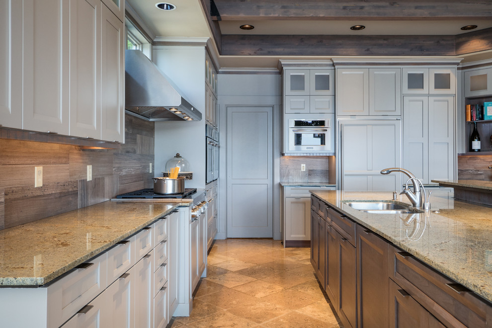 Transitional kitchen photo in Seattle with shaker cabinets