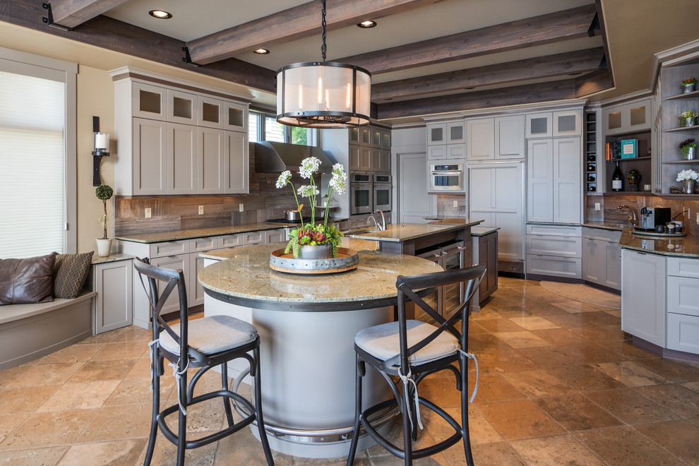 Example of a huge transitional kitchen design in Seattle with shaker cabinets and stainless steel appliances