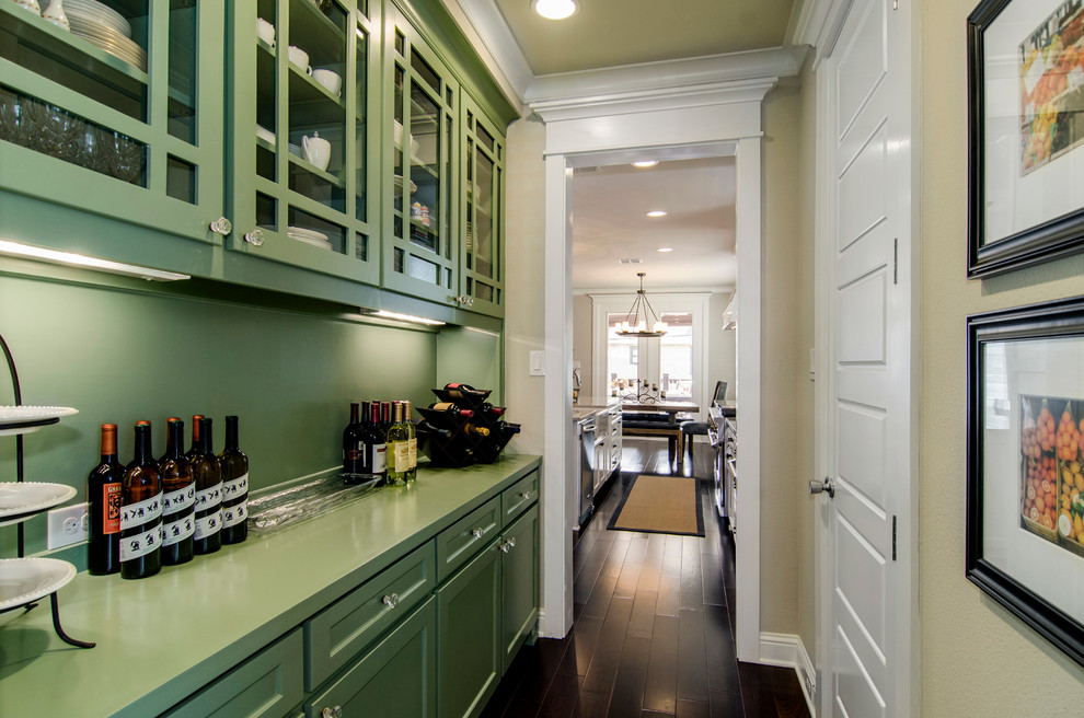 Design ideas for a classic kitchen in Dallas with glass-front cabinets, green cabinets, green splashback and green worktops.