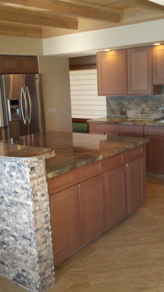 Example of a trendy u-shaped eat-in kitchen design in Seattle with an undermount sink, shaker cabinets, medium tone wood cabinets, granite countertops, green backsplash and stainless steel appliances