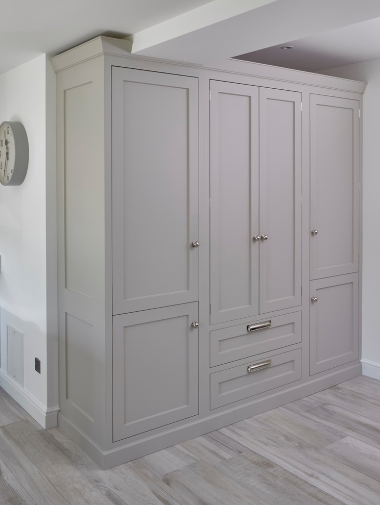 Example of a mid-sized transitional single-wall porcelain tile and gray floor eat-in kitchen design in Other with quartzite countertops, an island, an undermount sink, shaker cabinets, gray cabinets, white backsplash, stainless steel appliances and white countertops