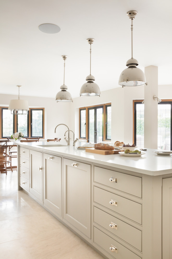 This is an example of a large contemporary single-wall kitchen in Buckinghamshire.