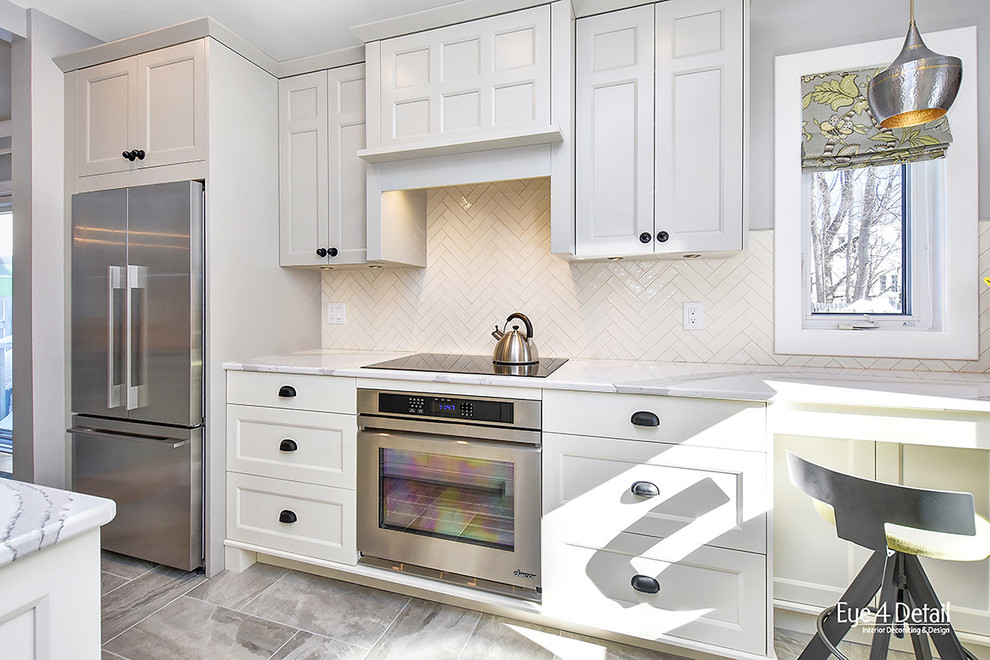 Small classic galley enclosed kitchen in Ottawa with a single-bowl sink, recessed-panel cabinets, grey cabinets, engineered stone countertops, stainless steel appliances, porcelain flooring and metro tiled splashback.