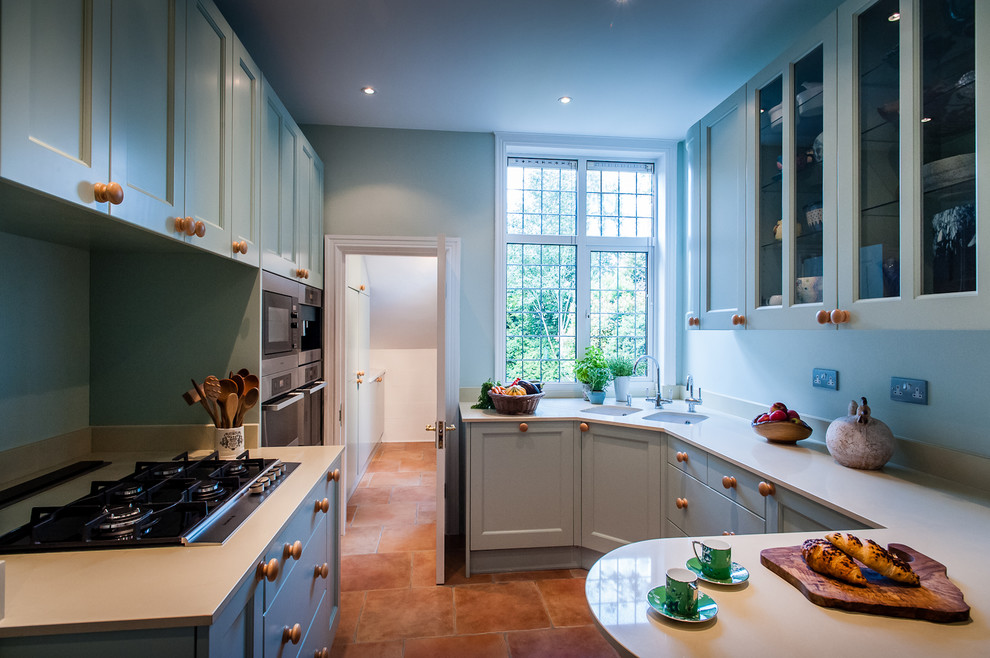 Small classic kitchen in Kent.