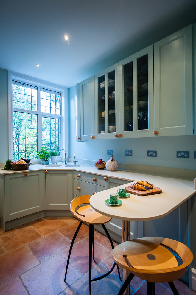 This is an example of a small classic kitchen in Kent.