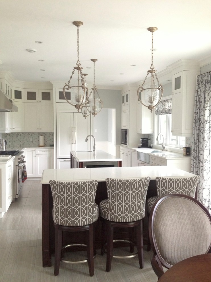 Example of a transitional kitchen design in Montreal