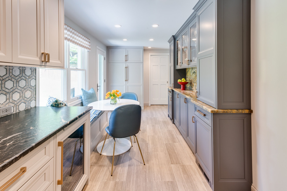 Example of a mid-sized transitional galley ceramic tile and gray floor enclosed kitchen design in DC Metro with a single-bowl sink, shaker cabinets, gray cabinets, granite countertops, multicolored backsplash, ceramic backsplash, stainless steel appliances, no island and black countertops