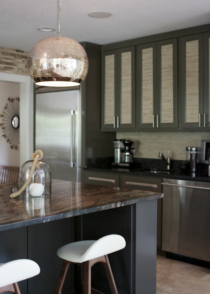 This is an example of a contemporary kitchen in Raleigh.