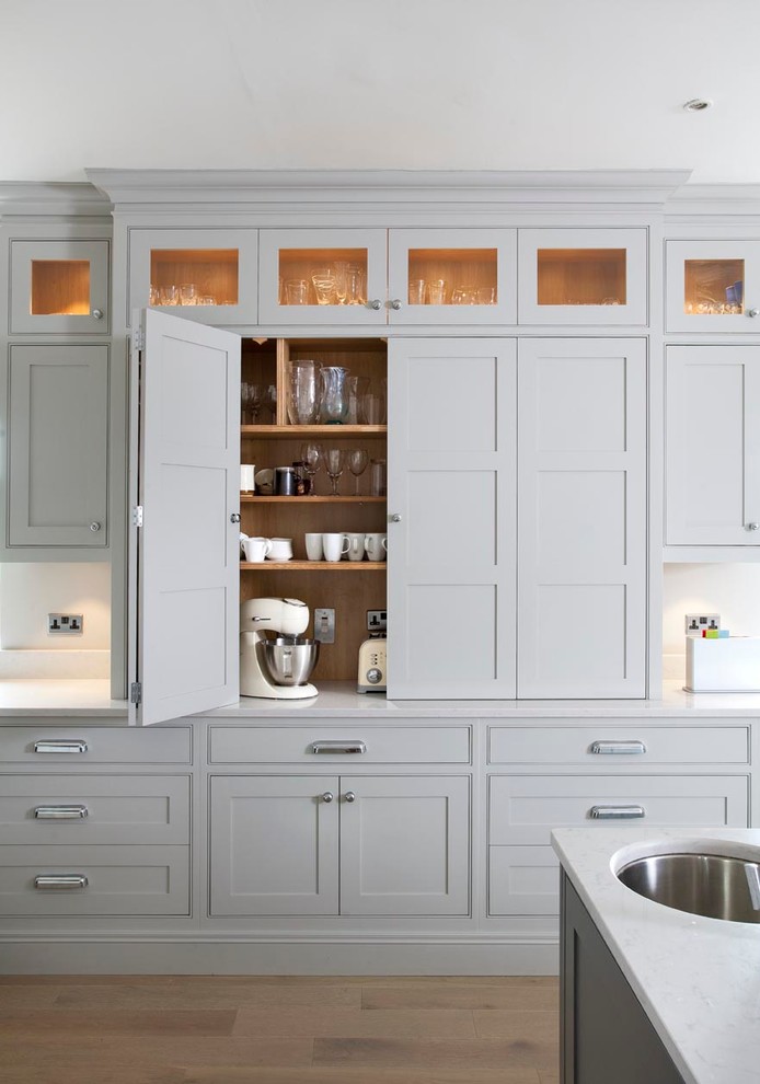 Transitional kitchen photo in Dublin with beaded inset cabinets, gray cabinets, quartz countertops and an undermount sink