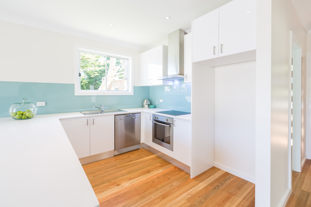 Example of a beach style kitchen design in Sydney