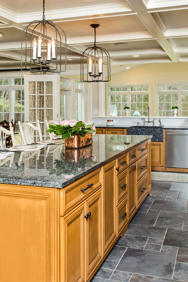 Eat-in kitchen - traditional ceramic tile eat-in kitchen idea in Boston with a farmhouse sink, flat-panel cabinets, medium tone wood cabinets, laminate countertops, blue backsplash, ceramic backsplash, colored appliances and an island