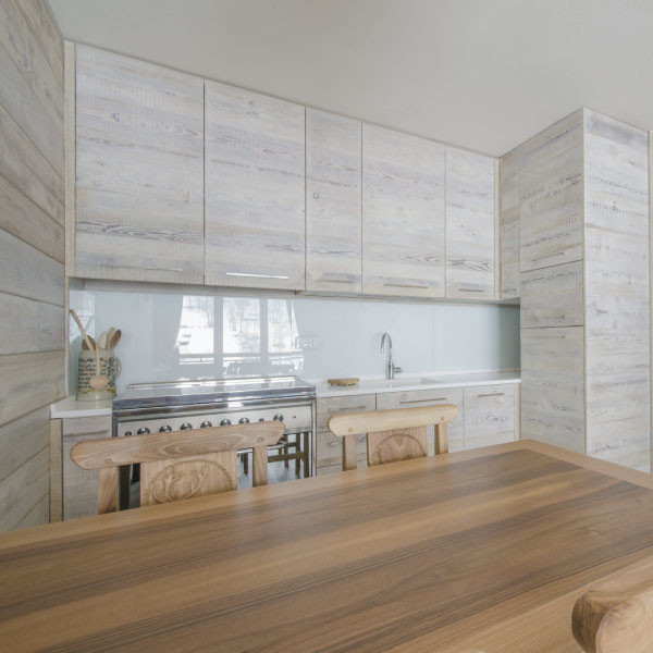 Inspiration for a timeless single-wall eat-in kitchen remodel in San Francisco with a single-bowl sink, flat-panel cabinets, light wood cabinets and no island