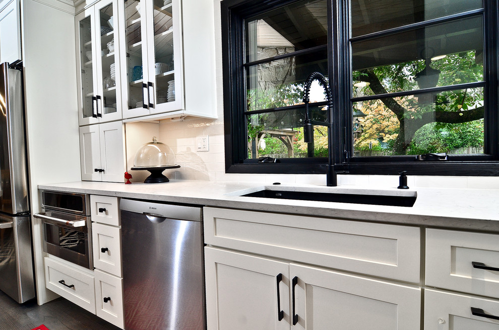 Black accents with white cabinets - Traditional - Kitchen - Portland