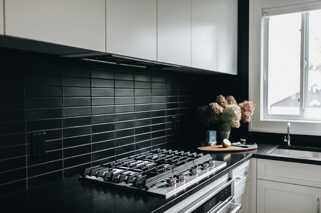 black matte tile backsplash