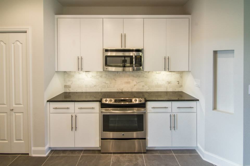 Black Pearl granite w/ white marble backsplash Transitional Kitchen Other by Wolde