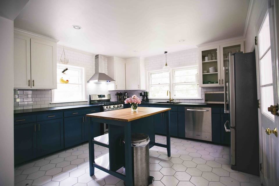 Transitional l-shaped kitchen photo in Raleigh with an undermount sink, blue cabinets, soapstone countertops, gray backsplash, subway tile backsplash, stainless steel appliances and an island
