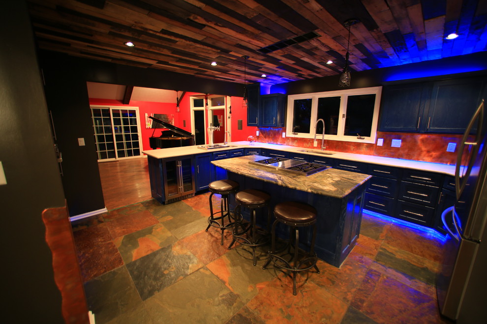 Example of a large trendy u-shaped dark wood floor and multicolored floor eat-in kitchen design in Indianapolis with an undermount sink, recessed-panel cabinets, dark wood cabinets, marble countertops, beige backsplash, metal backsplash, stainless steel appliances and an island