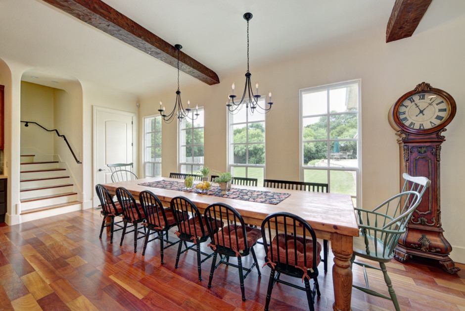 Photo of a farmhouse dining room in Austin.