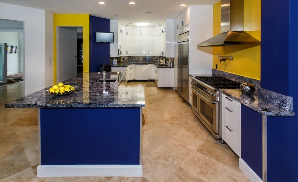 Inspiration for a contemporary kitchen/diner in Miami with granite worktops, blue splashback, stone slab splashback, a submerged sink, flat-panel cabinets, white cabinets and an island.
