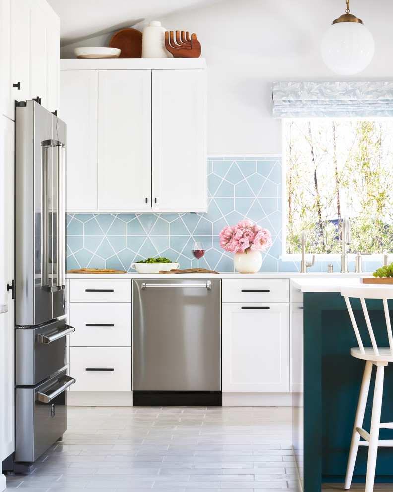 Classic kitchen in San Francisco with blue splashback and cement tile splashback.