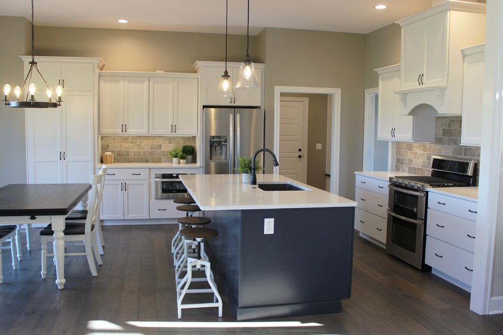 Blue Kitchen Island in Edgebrooke Homes Bettendorf, Iowa Kitchen