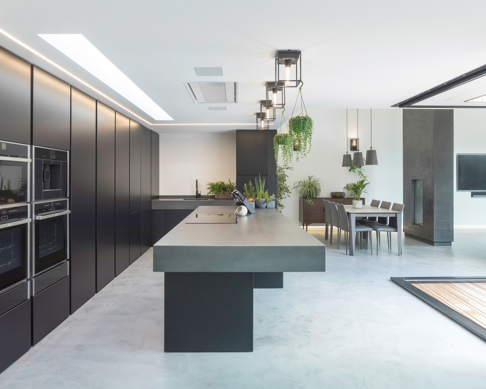 Example of a minimalist kitchen design in Channel Islands