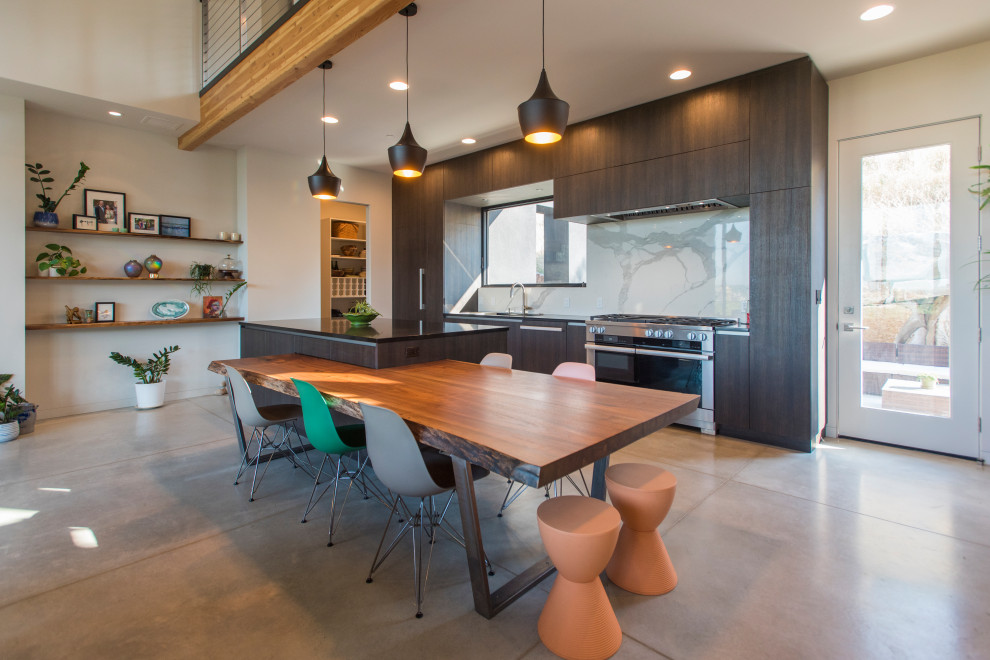 Inspiration for a mid-sized contemporary single-wall eat-in kitchen remodel in Boise with flat-panel cabinets, gray cabinets and an island