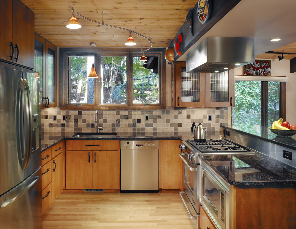 Example of an eclectic kitchen design in DC Metro with stainless steel appliances