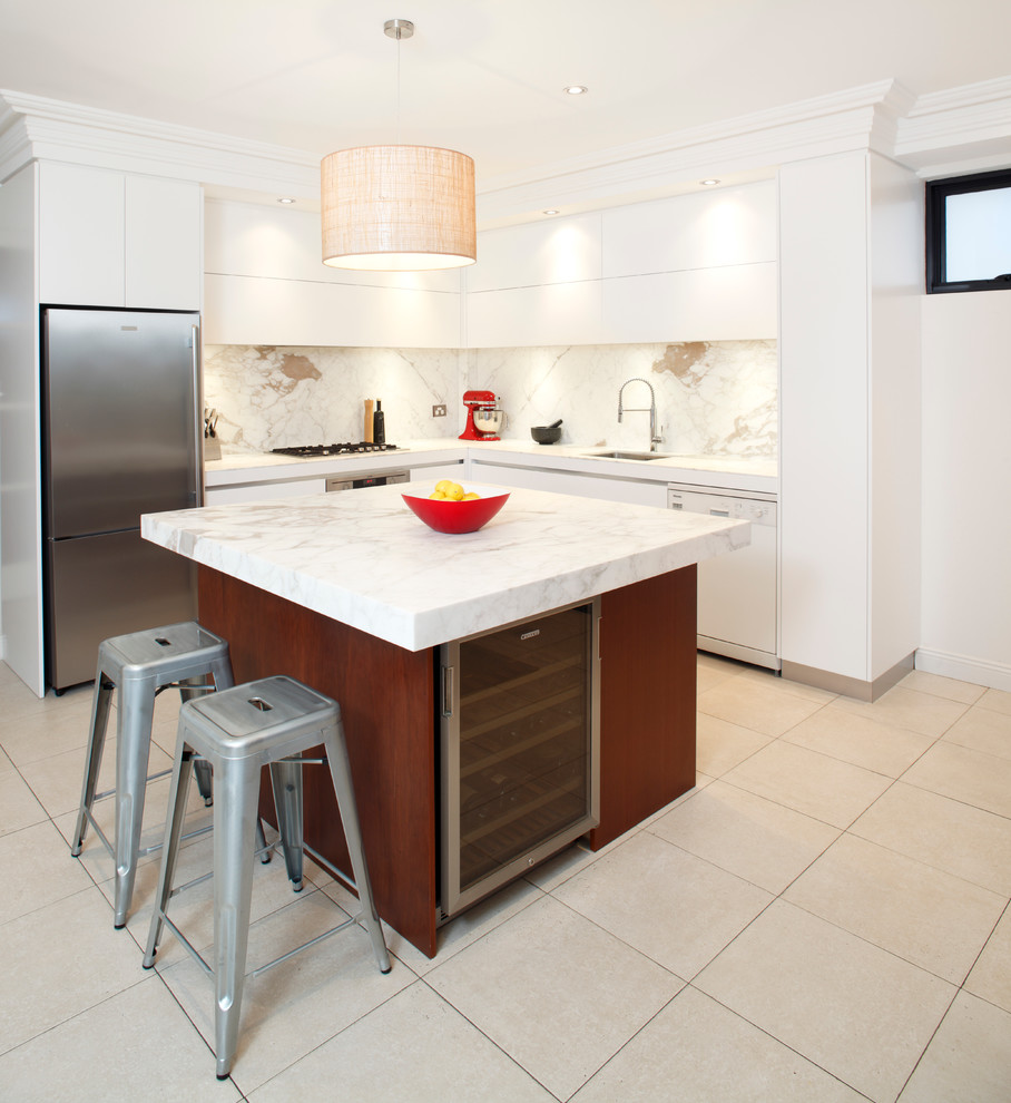 Small u-shaped ceramic tile eat-in kitchen photo in Sydney with a drop-in sink, flat-panel cabinets, medium tone wood cabinets, marble countertops, stone slab backsplash, stainless steel appliances, an island and multicolored backsplash