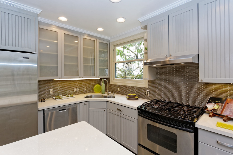 Eat-in kitchen - large transitional l-shaped slate floor eat-in kitchen idea in San Francisco with an undermount sink, beaded inset cabinets, gray cabinets, quartzite countertops, gray backsplash, porcelain backsplash, stainless steel appliances and an island